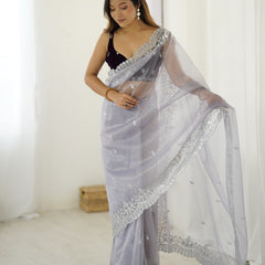 Twill Net with Dazzling Sequin and Rich Zari Work Saree